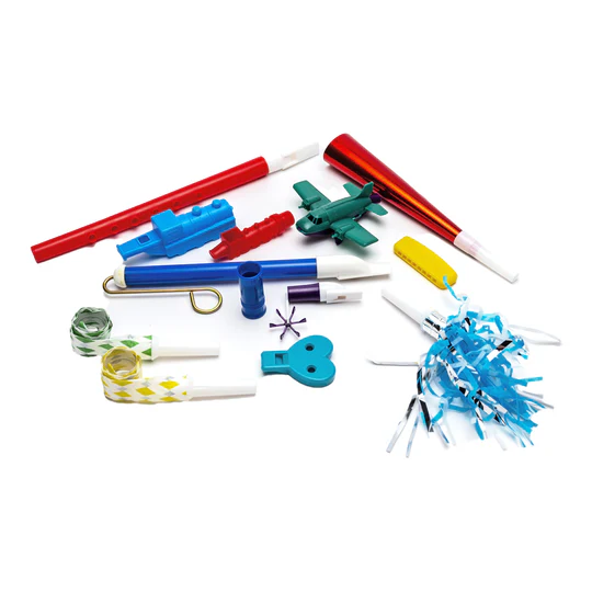 Colorful assortment of TalkTools Horn Kit therapy horns and whistles, including various plastic horns, party blowers, and noisemakers laid out on a white background.