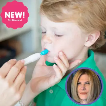 Speech therapist using tactile cues to help a child articulate the /k/ sound during a speech therapy session, representing techniques taught in the course "How to Elicit the /K/ Sound."
