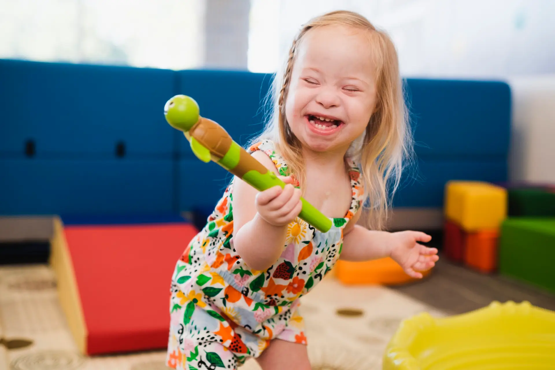 child holding a jiggler